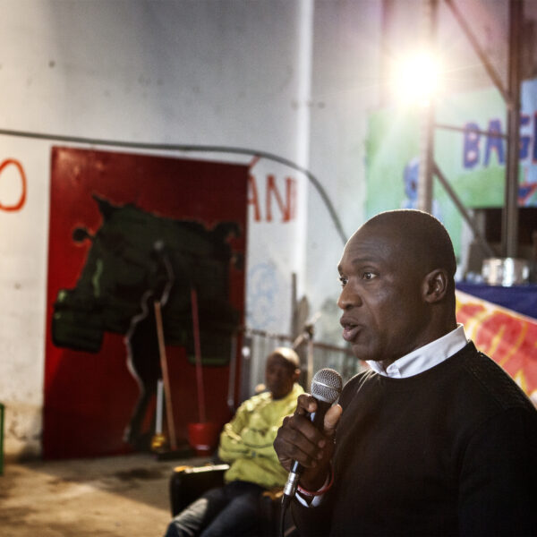 Capt Doe Prosper durin an assembly at the Senegalese shelter, a hemp factory disused.
Caserta 2015.