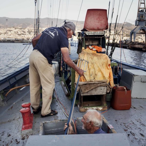 Fishing the swordfish to Stretto of Messina (Sicily) with Arena family on Simone boat.Story about passing the fishing tradition by father to son.Fight between human and animal, men against fish.